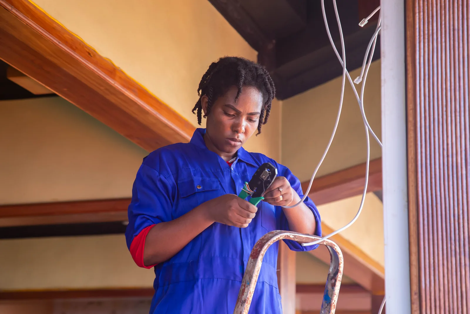 Terminating a cable from a step ladder, for electrician services in Cincinnati