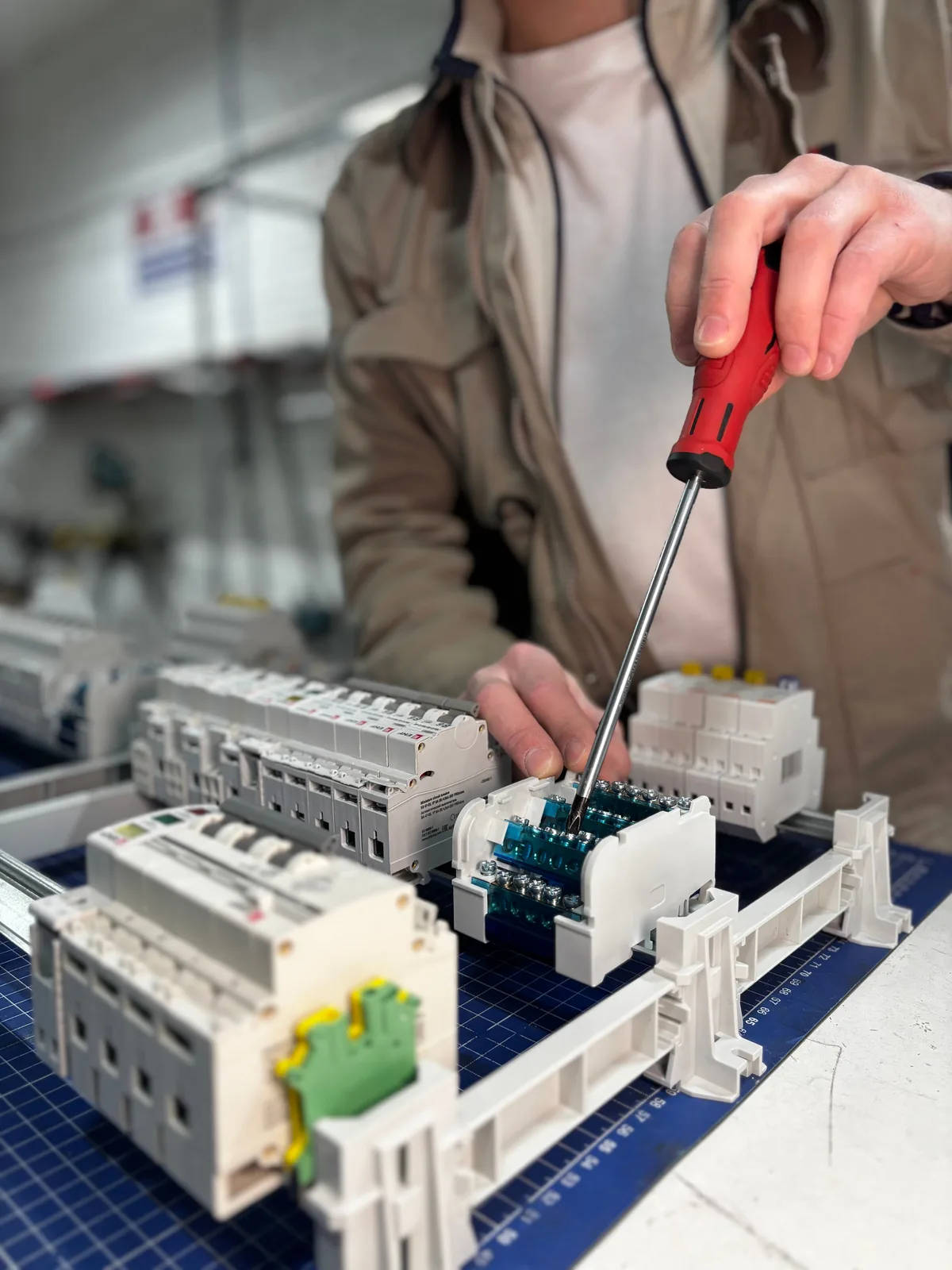 Breakers assembled on a DIN rail before installation, for licensed electrician in Cincinnati