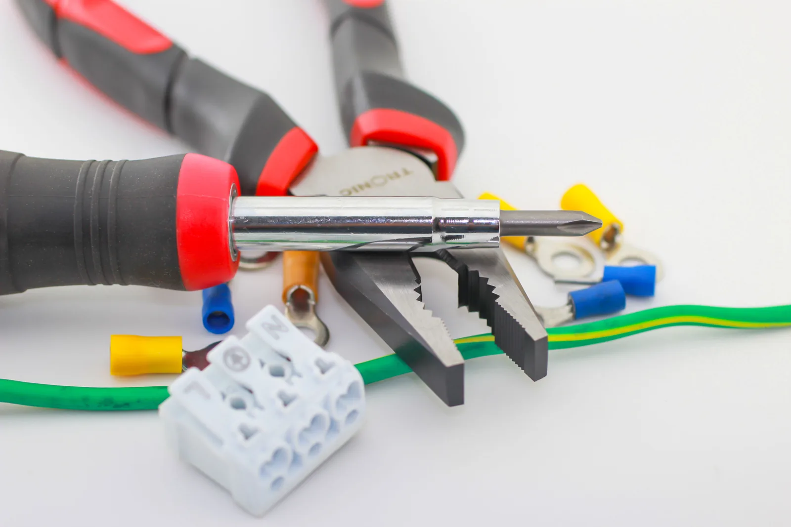Pliers, a screwdriver, ferrules and a connector block, for electrician in Cincinnati