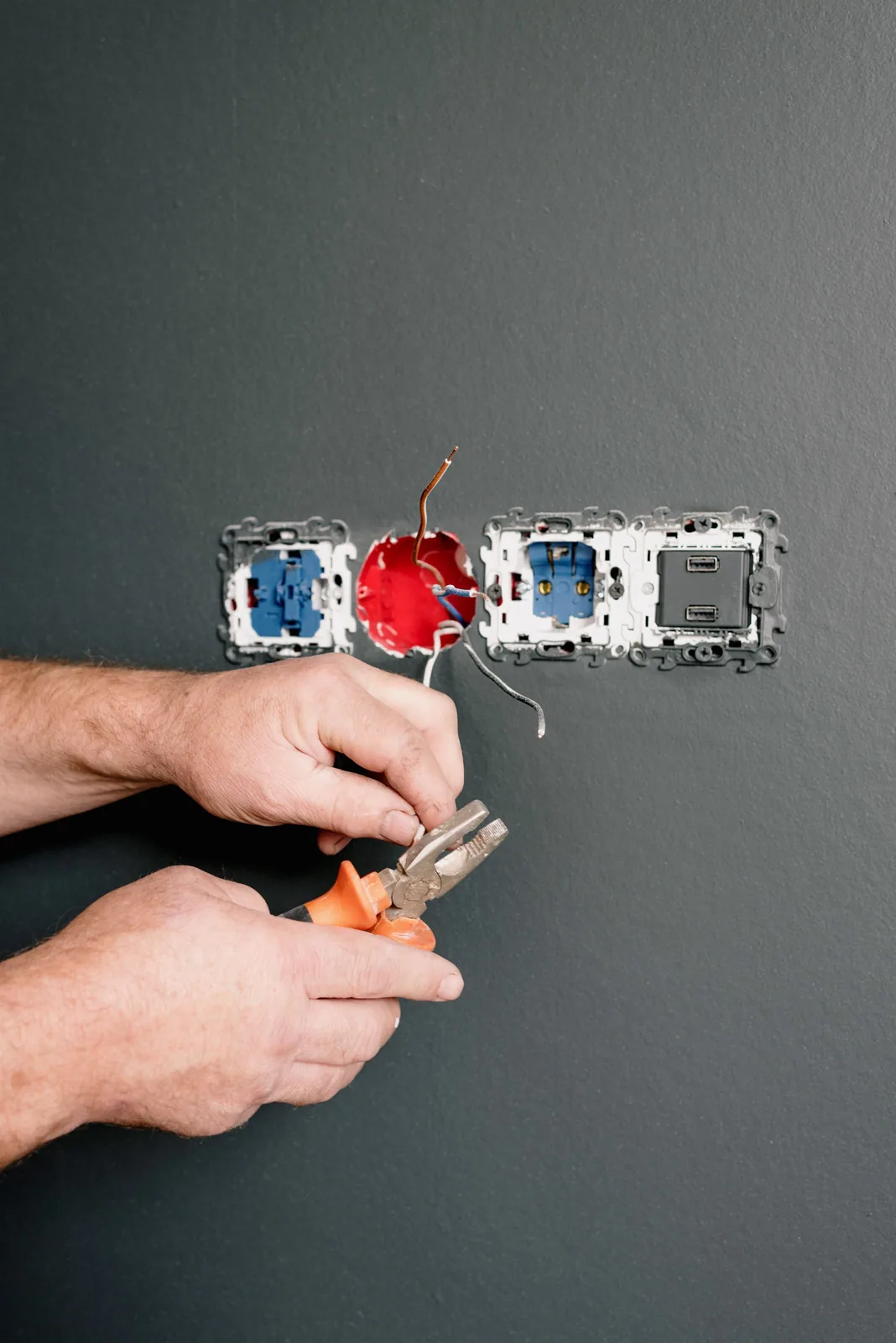 Wiring an outlet box into a finished wall, for code violation in Cincinnati