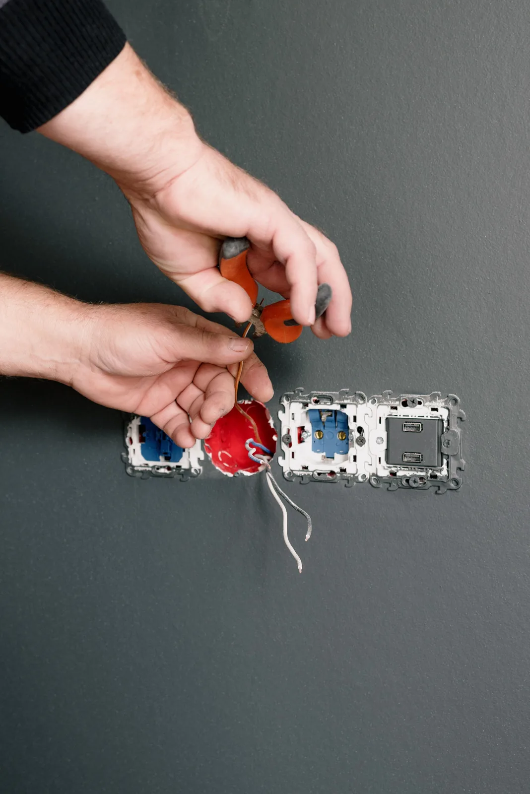 Stripping conductors at an outlet box, for outlet installation in Cincinnati